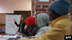 Des réfugiés africains en classe, dans le monastère de Thal-Marmoutier, en France, le 1er février 2018.