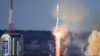 FILE - In this photo released by Roscosmos space corporation on Feb. 29, 2024, a rocket carrying an Iranian satellite blasts off near Tsiolkovsky, Russia. Iranian media reported on Oct. 12, 2024, that it has sent two more satellites to Russia to be put into orbit.