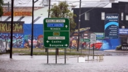 Jalan yang terendam banjir terlihat di kota Lismore, Australia, di wilayah utara New South Wales (9/3). 