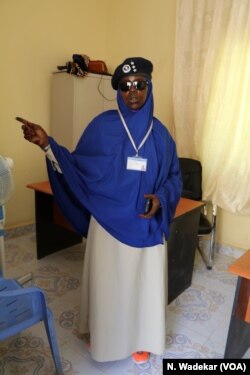 Officer Kis Shamis Kabdi Bile is the only woman in Garowe's Criminal Investigation Division in Somalia.