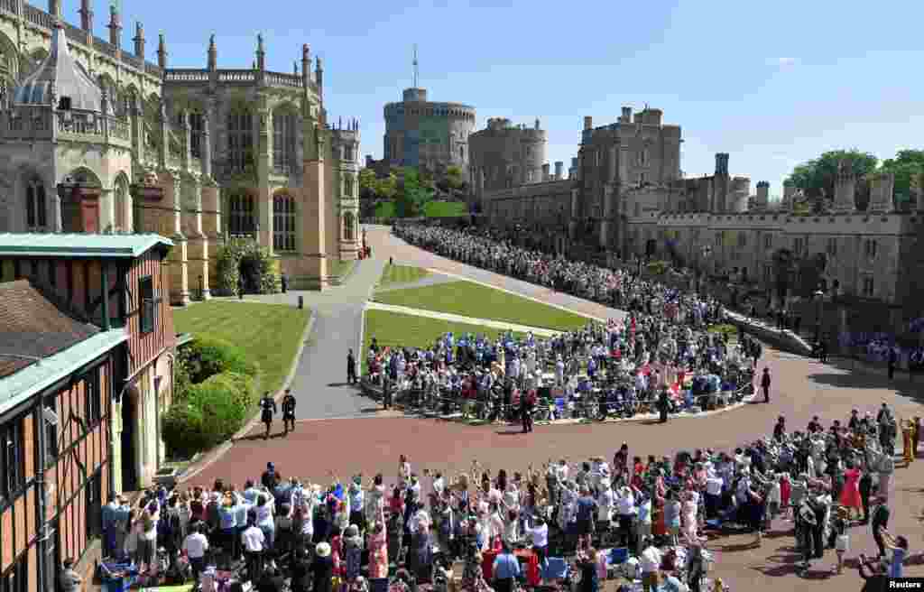 Príncipe Harry e Príncipe William chegam à cerimónia de casamento , na capela de S. George no castelo de Windsor. 19 de Maio, 2018.