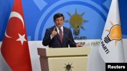 Turkey's Prime Minister Ahmet Davutoglu speaks during a news conference at his ruling AK Party (AKP) headquarters in Ankara, Turkey, August 13, 2015. Turkey faces a snap election this autumn after talks on forming a coalition government broke down on Thur