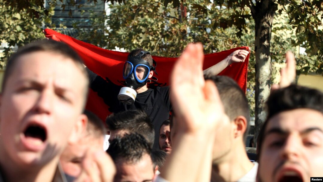 Demonstrators protest against the potential dismantling of Syrian chemical weapons in Albania in front of the Parliament in Tirana, Nov. 14, 2013.