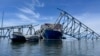 Jembatan Francis Scott Key yang roboh di Baltimore pada Minggu, 31 Maret 2024, saat penyelam membantu kru dalam operasi pemindahan baja dan beton yang rumit dan teliti. (Foto: AP/Mike Pesoli)