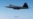 비행 중 레이더 유도식 AIM-120 미사일을 발사하는 F-22 랩터 첨단 전술 전투기 (자료 사진)