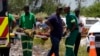 A miner is transported on a stretcher by rescue workers after he was rescued from below ground in an abandoned gold mine in Stilfontein, South Africa, Jan. 14, 2025.