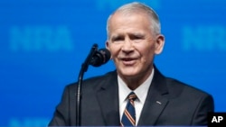 Former U.S. Marine Lt. Col. Oliver North speaks before giving the Invocation at the National Rifle Association-Institute for Legislative Action Leadership Forum in Dallas, May 4, 2018.