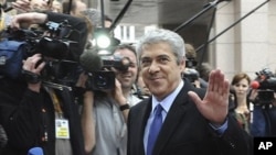 Portugal's Caretaker Prime Minister Jose Socrates arrives for an EU summit in Brussels, March 24, 2011