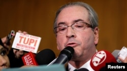 FILE - Brazilian suspended House Speaker Eduardo Cunha speaks during a news conference at the National Congress in Brasilia, Brazil, July 7, 2016.