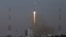 A Soyuz-2.1b rocket booster with a Fregat upper stage and satellites of British firm OneWeb blasts off from a launchpad at the Vostochny Cosmodrome in Amur Region, Russia, March 25, 2021. 