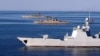 Kapal perang berlayar di Laut Oman pada hari kedua latihan perang angkatan laut gabungan Iran, Rusia dan China pada 2019. (Foto: melalui AP)