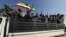 FILE - Members of Amhara region militias ride on their truck as they head to face the Tigray People's Liberation Front (TPLF), in Sanja, Amhara region near a border with Tigray, Ethiopia, Nov. 9, 2020.