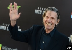 FILE - Leonard Nimoy arrives at the Los Angeles premiere of "Star Trek Into Darkness" at the Dolby Theater, May 14, 2013.