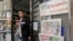 FILE - Turkish newspapers are sold in front of a shop at the Turkish neighborhood in Duisburg-Marxloh, Germany, Monday, Oct. 31, 2011. 