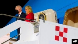 President Joe Biden and first lady Jill Biden arrive at Rome-Fiumicino International Airport to attend the G-20 leaders meeting, in Rome, Oct. 29, 2021. 