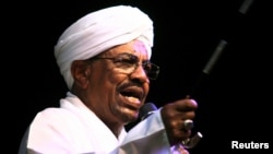 FILE - Sudan's President Omar Hassan al-Bashir speaks to the crowd after a swearing-in ceremony at green square in Khartoum, June 2, 2015. 