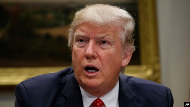 President Donald Trump speaks during a meeting with county sheriffs in the Roosevelt Room of the White House in Washington, Feb. 7, 2017.