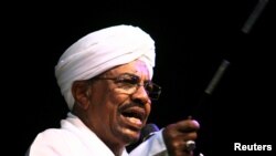 Sudan's President Omar Hassan al-Bashir speaks to the crowd after a swearing-in ceremony at green square in Khartoum, June 2, 2015. 