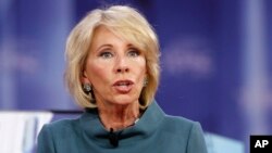FILE - Education Secretary Betsy DeVos speaks during the Conservative Political Action Conference (CPAC), at National Harbor, Maryland, Feb. 22, 2018.