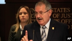 Puerto Rico Police Superintendent, Jose Caldero speaks during a news conference about charges filed against 10 Puerto Rico police officers at the United States Attorney's Office in San Juan, Puerto Rico, Sept. 29, 2015.