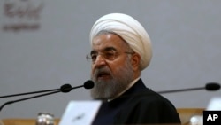 Iranian President Hassan Rouhani speaks during the 29th International Islamic Unity Conference in Tehran, Iran, Dec. 27, 2015.