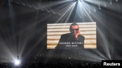 Chris Martin of Coldplay performs a tribute to George Michael at the Brit Awards at the O2 Arena in London, Feb. 22, 2017.