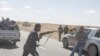 Pemberontak Serang Balik Pasukan Gaddafi antara Bin Jawad dan Ras Lanuf