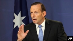 FILE - Australia's Prime Minister Tony Abbott speaks during a press conference in Sydney, Australia, July 19, 2014.
