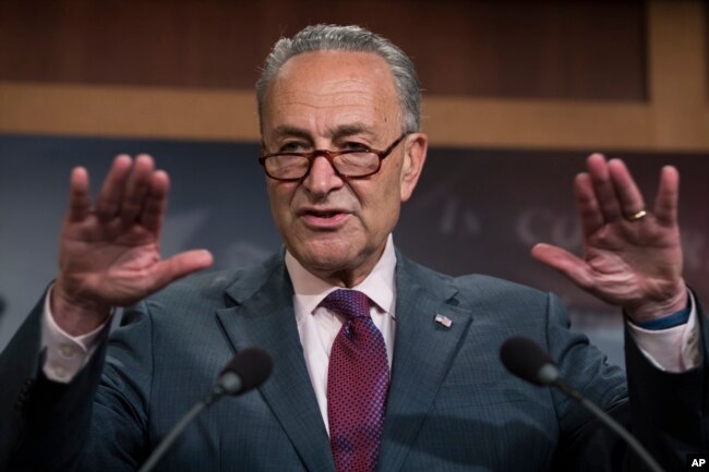 FILE - Senate Minority Leader Chuck Schumer of New York speaks to reporters on Capitol Hill in Washington, July 28, 2017, after the Republican-controlled Senate proved unable to repeal and replace the Affordable Care Act.