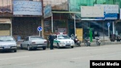 Iranian special police forces patrol the empty streets of Baneh, May 4, 2018, as residents continue a general strike they began on April 15 to protest Tehran's blockade of border footpaths they rely on to import goods to sell.