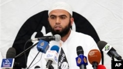 The radical Ansar al-Sharia group threatens to defy Tunisian government efforts to control its activities. Its spokesman, Saif Eddine Errais, speaks at a rally May 16, 2013.