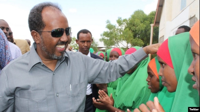 Somali President Hassan Sheikh Mohamud is greeted by children at Dadaab refugee camp in eastern Kenya, June 6, 2016. The camp, established in the early 1990s, houses more than 300,000 displaced Somalis. (via @TheVillaSomalia)
