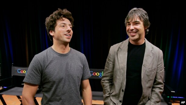 FILE - Google co-founders Sergey Brin, left, and Larry Page talk during a new conference at Google Inc. headquarters in Mountain View, California, Sept. 2, 2008. Like many startups, Google started in a garage.