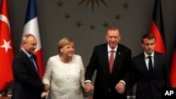 Putin Merkel Erdoğan ve Macron en son Türkiye'deki Suriye Zirvesi'nde bir araya gelmişti