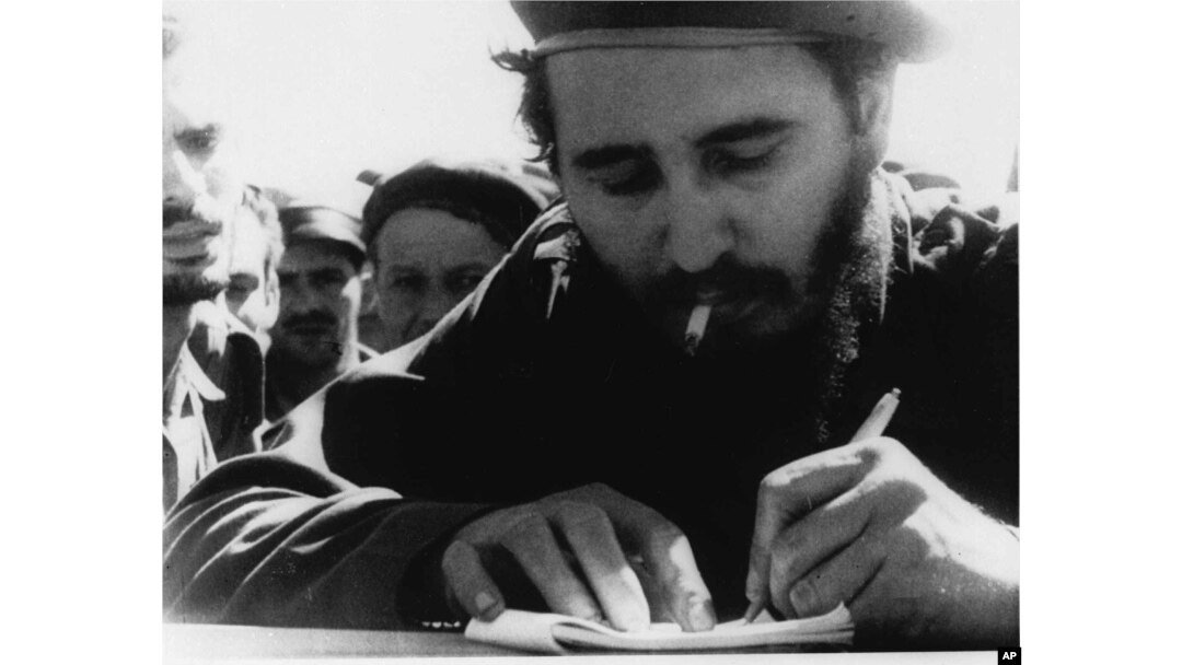 Fidel Castro is pictured at the front during the Bay of Pigs invasion in this 1961 photo.