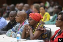 Members of the ZANU PF Central Committee attend a meeting at the party headquarters in Harare, Nov, 19, 2017.