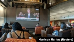 Students watch the hearing of U.S. Supreme Court nominee Brett Kavanaugh at the Walter Cronkite School of Journalism and Mass Communication at Arizona State University, Phoenix, Sept. 27, 2018, in this picture obtained from social media.