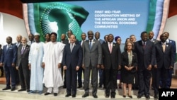 Heads of States and government pose for a photo session at the end of the closing ceremony of the African Union summit at the Palais des Congres in Niamey, on July 8, 2019. (AFP)