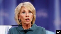 FILE - Education Secretary Betsy DeVos speaks during the Conservative Political Action Conference (CPAC), at National Harbor, Maryland, Feb. 22, 2018.