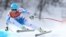 Austria's Matthias Mayer makes a turn in the men's downhill at the Sochi 2014 Winter Olympics, Sunday, Feb. 9, 2014, in Krasnaya Polyana, Russia.