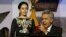 Ecuador's President Lenin Moreno gives a speech, as his wife Rocio Gonzalez listens to him, from the government palace balcony in Quito, Ecuador, May 24, 2017.