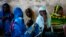 Internally displaced women from Bangui attend a community meeting in Bambari, Central African Republic, June 16, 2014.