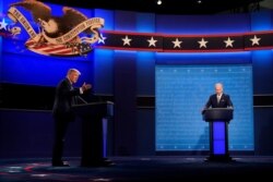 FILE - President Donald Trump and Democratic presidential candidate former Vice President Joe Biden during the first presidential debate, Sept. 29, 2020, at Case Western University and Cleveland Clinic, in Cleveland, Ohio.
