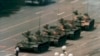 FILE - In this June 5, 1989, file photo, a Chinese man stands alone to block a line of tanks heading east on Beijing's Changan Boulevard in Tiananmen Square.