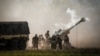 Artillery are fired during joint military drills at a firing range in northern Australia as part of Exercise Talisman Sabre, the largest combined training activity between the Australian Defence Force and the United States military, in Shoalwater Bay on J