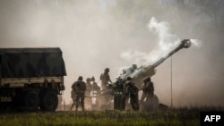 Artillery are fired during joint military drills at a firing range in northern Australia as part of Exercise Talisman Sabre, the largest combined training activity between the Australian Defence Force and the United States military, in Shoalwater Bay on J