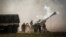 Artillery are fired during joint military drills at a firing range in northern Australia as part of Exercise Talisman Sabre, the largest combined training activity between the Australian Defence Force and the United States military, in Shoalwater Bay on J
