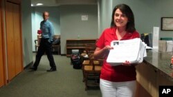 Republican U.S. Senate candidate Leah Vukmir submits nomination papers with Wisconsin elections officials in Madison, Wisconsin, May 30, 2018. 