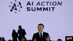 France's President Emmanuel Macron delivers a speech during a closing event for the first day of the Artificial Intelligence (AI) Action Summit, at the Grand Palais, in Paris, on Feb. 10, 2025.