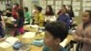 Third-graders at Los Angeles' Cahuenga Elementary School learn Korean songs as part of their bilingual education. (A. Martinez/VOA)